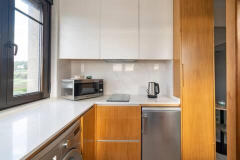 Apartamentos Las Olas By Pantin บัลโดวีโญ ภายนอก รูปภาพ
